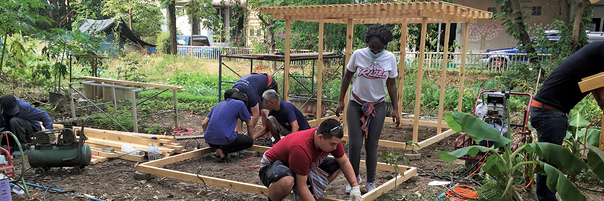 People Building Garden